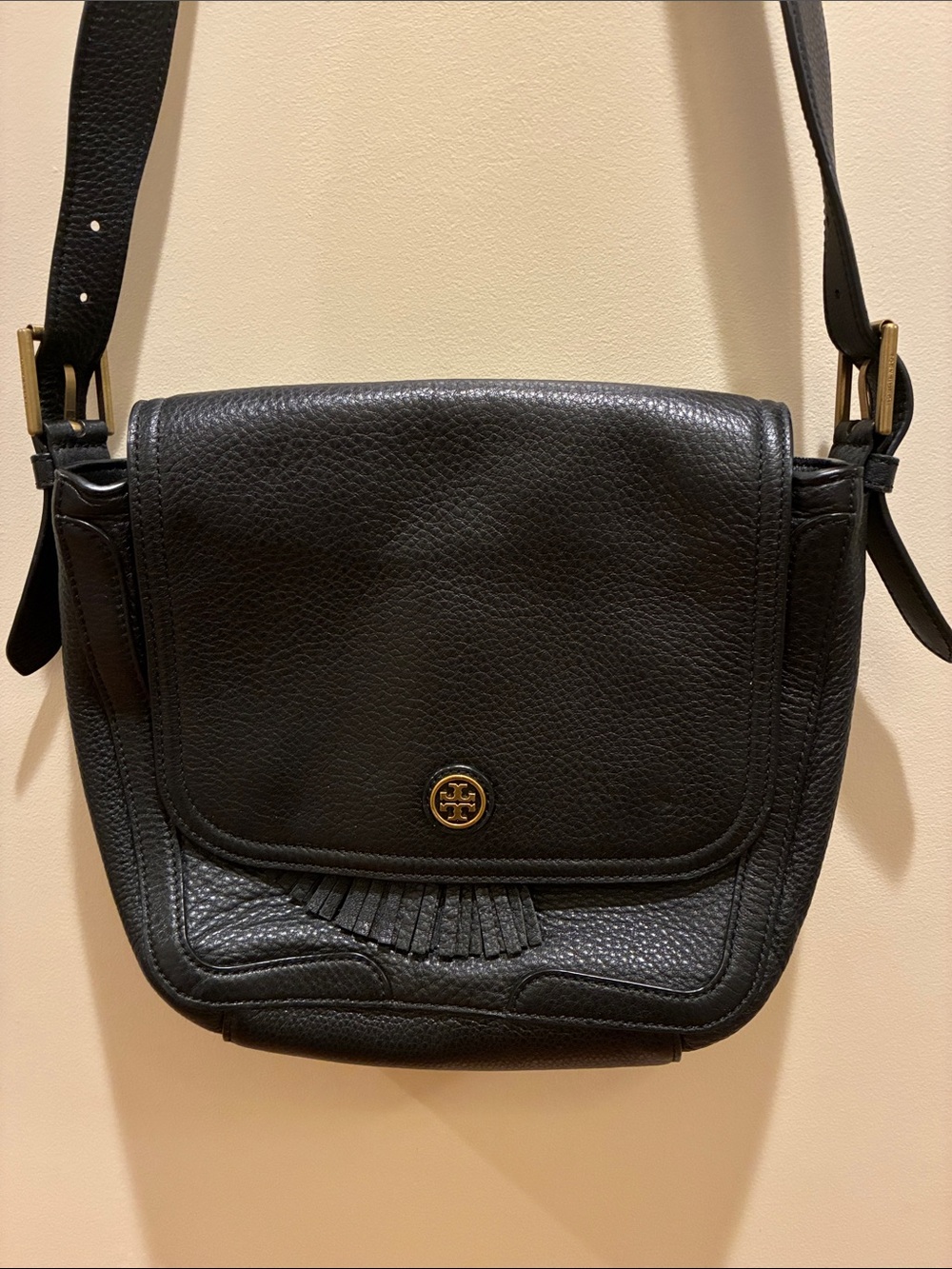Tory Burch Black Pebbled Leather Fringe Flap Crossbody with Gold Logo